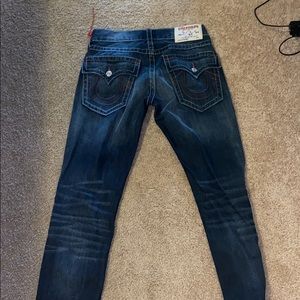 Navy blue True religion jeans with red stitch